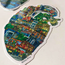 Load image into Gallery viewer, The Leslieville Heart maps out the iconic neighbourhood of Toronto's East End. From the waterfront Leslie Spit to strolling along Queen East, see if you can spot your fave spot to get cupcakes or donuts... or maybe just ride the streetcar!